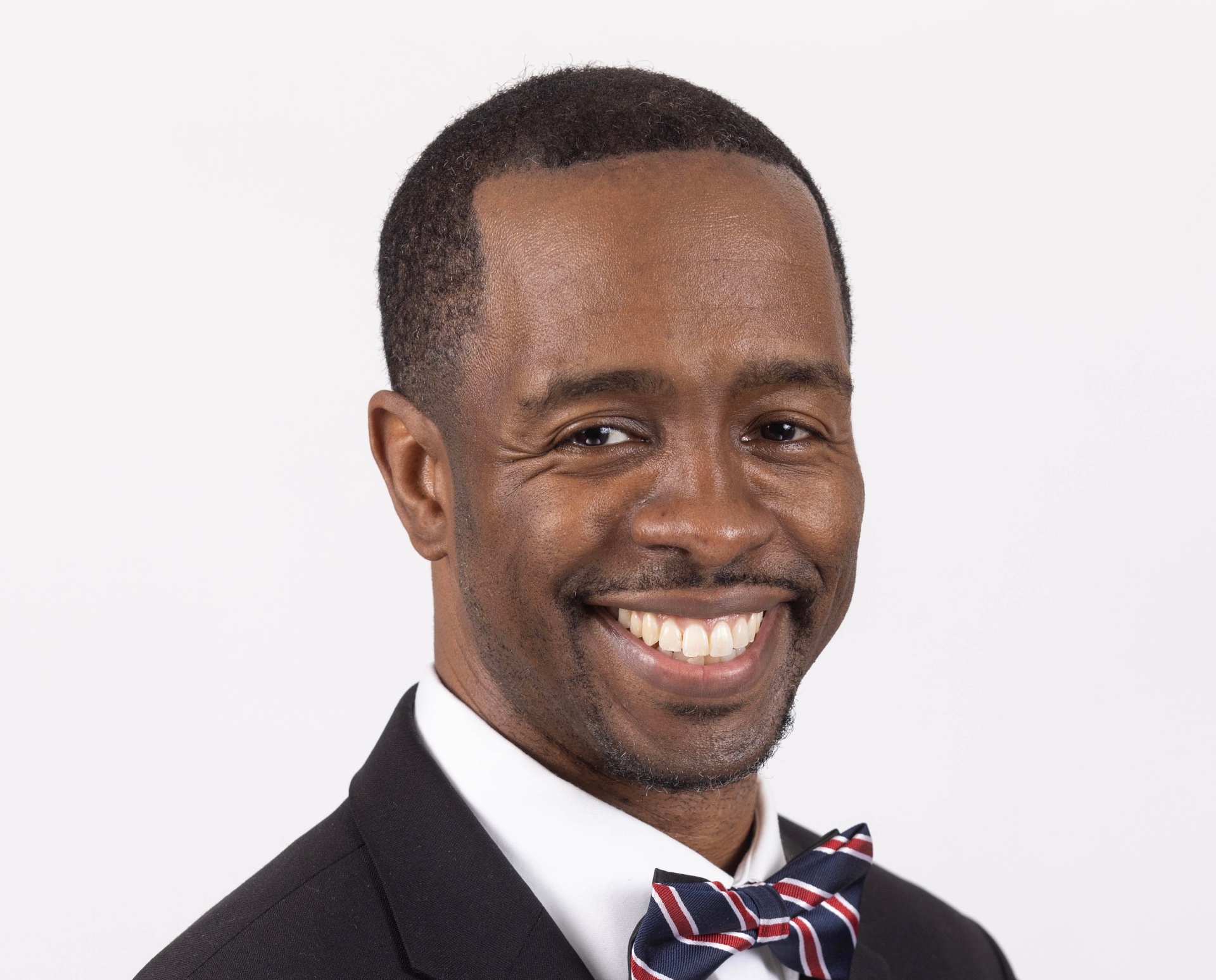 Dr. Marcus A. Huggans